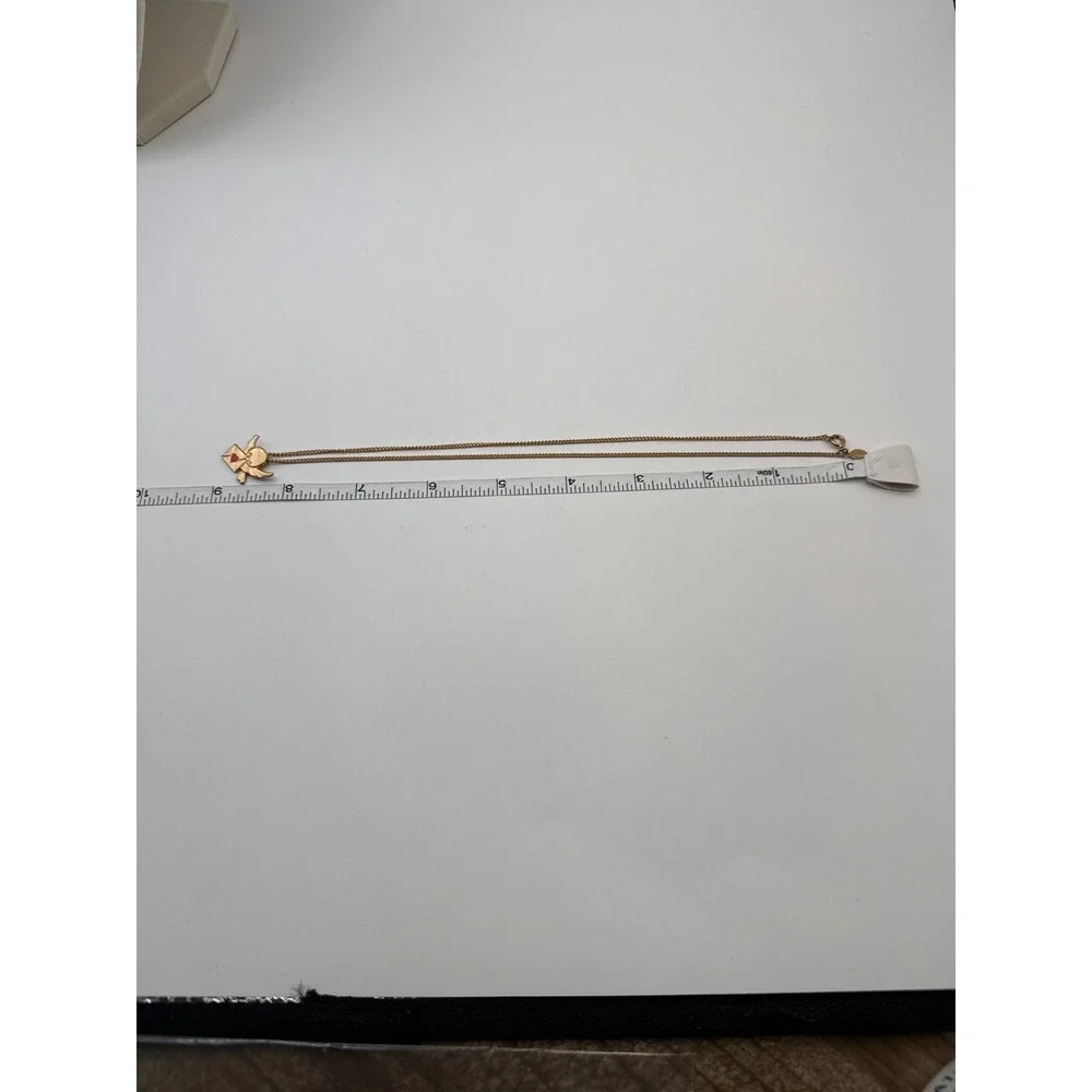 Avon gold tone
